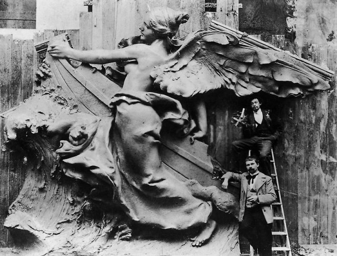 Ernst Barlach and Carl Garbers in front of the model for the central figure in the tympanum <br />of the New Town Hall in Altona, 1898